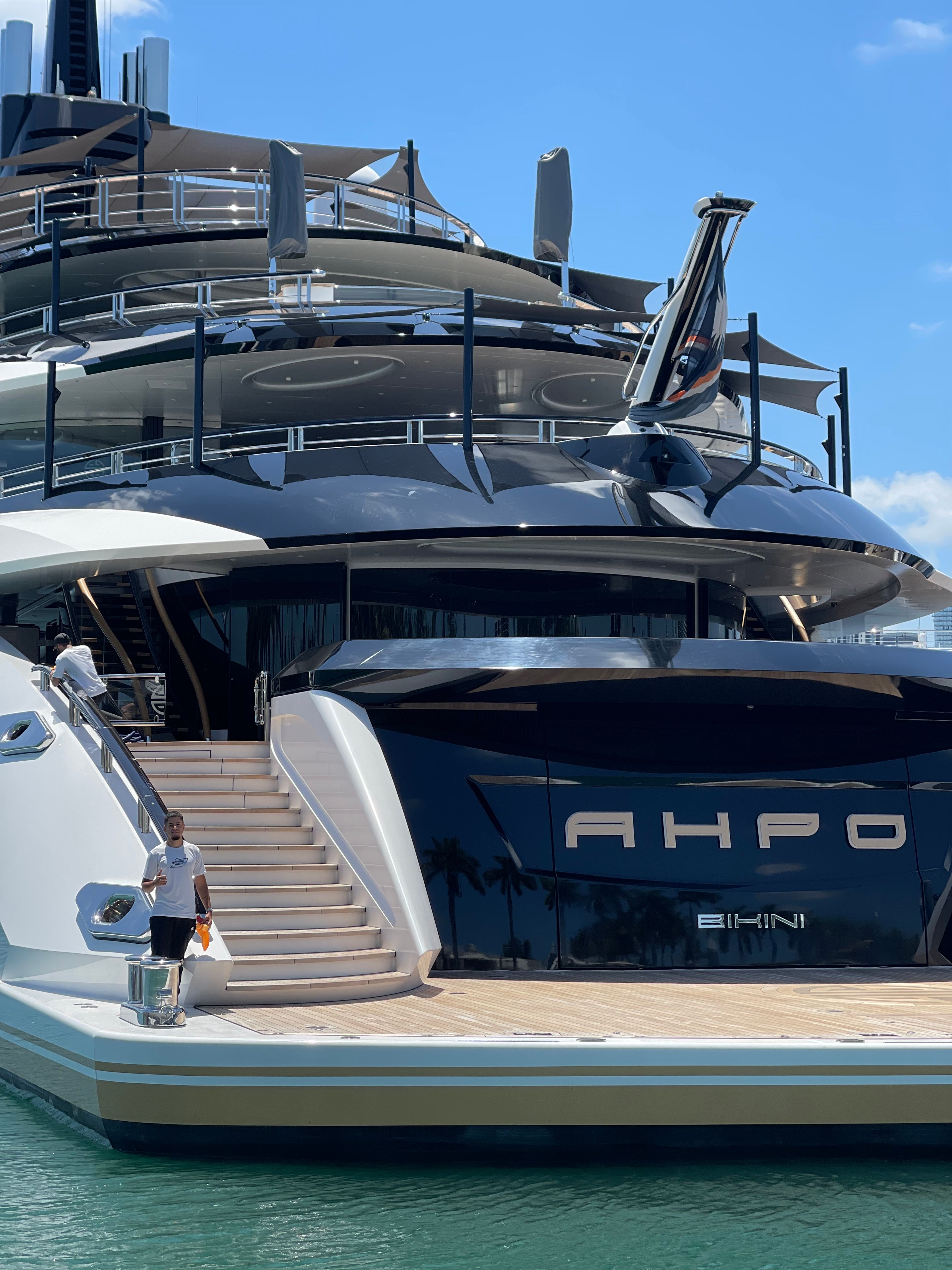 Mega Yacht black wrap boat named Alpo. Wrapped by south florida professionals.